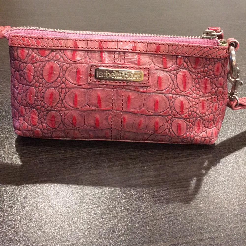 Pink magenta embossed leather wristlet